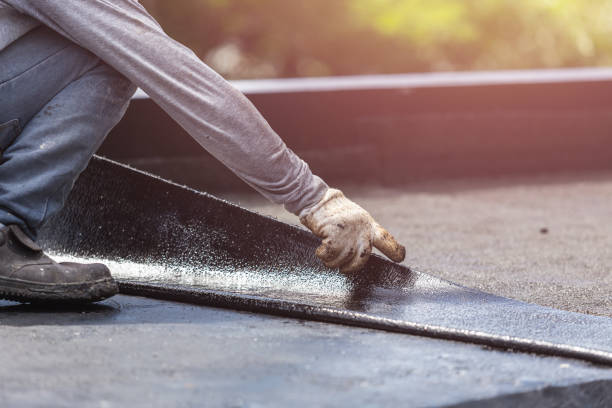 Professional Exterior Waterproofing technician working in Augusta, KS